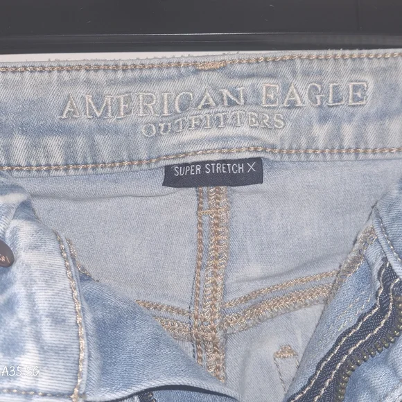 Very Distressed American Eagle Outfitters Light Blue Denim Jeans - Picture 3 of 4